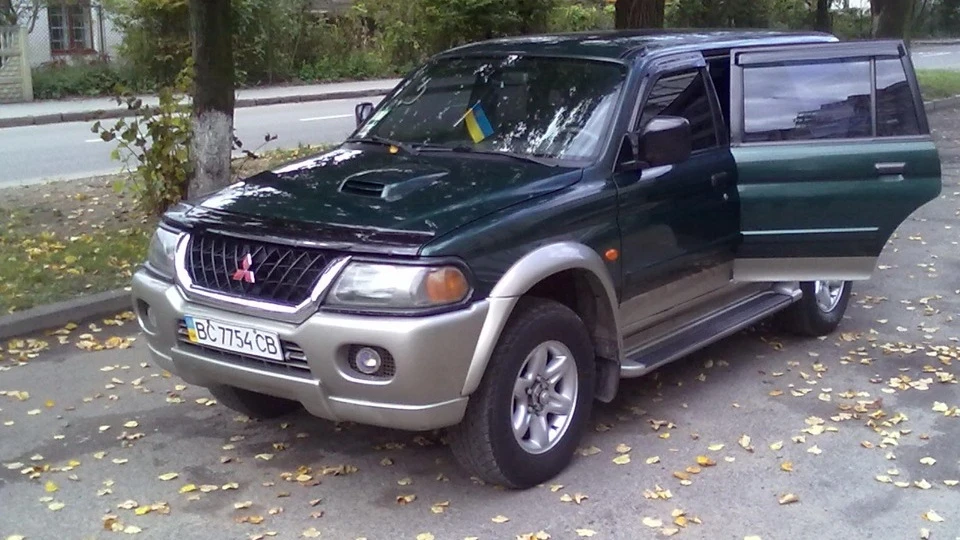 Mitsubishi Pajero Sport Карбон, ксенон,музон =) 2