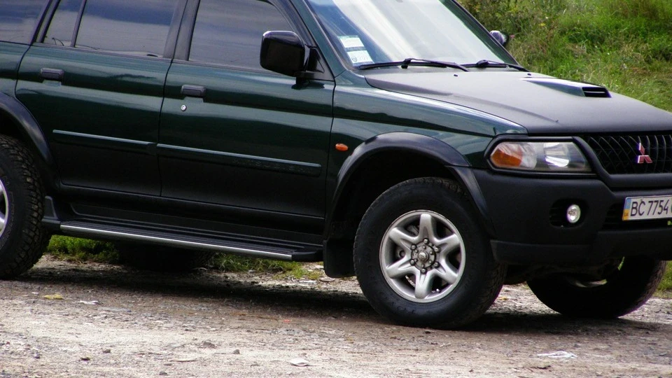 Mitsubishi Pajero Sport Карбон, ксенон,музон =) 5