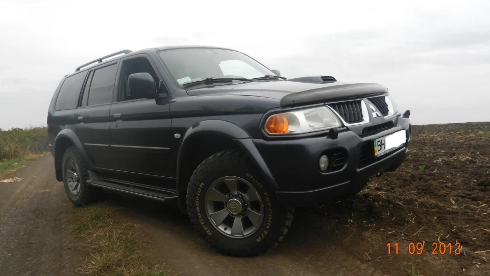 Mitsubishi Pajero Sport трактор 3