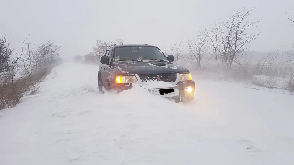 Mitsubishi Pajero Sport трактор 5
