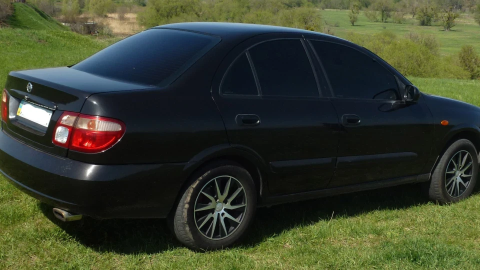 Nissan Almera 1,8 2