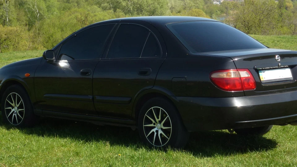 Nissan Almera 1,8 4