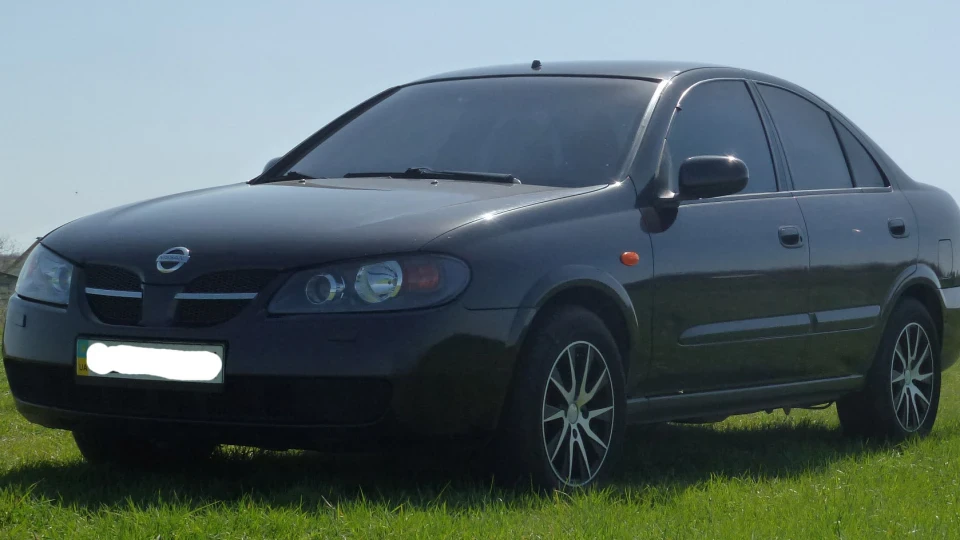 Nissan Almera 1,8 5