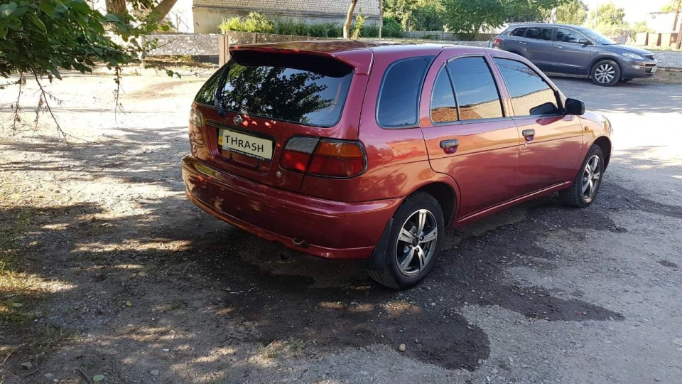 Nissan Almera AP0 - RED PEARL METALLIC