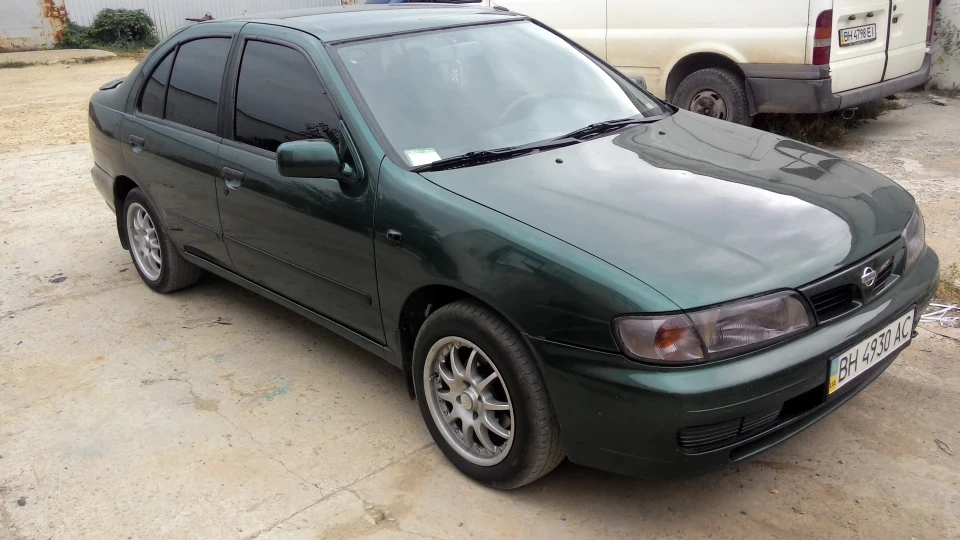 Nissan Almera Жаба 4