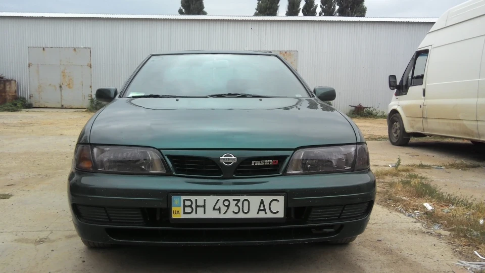 Nissan Almera Жаба 5