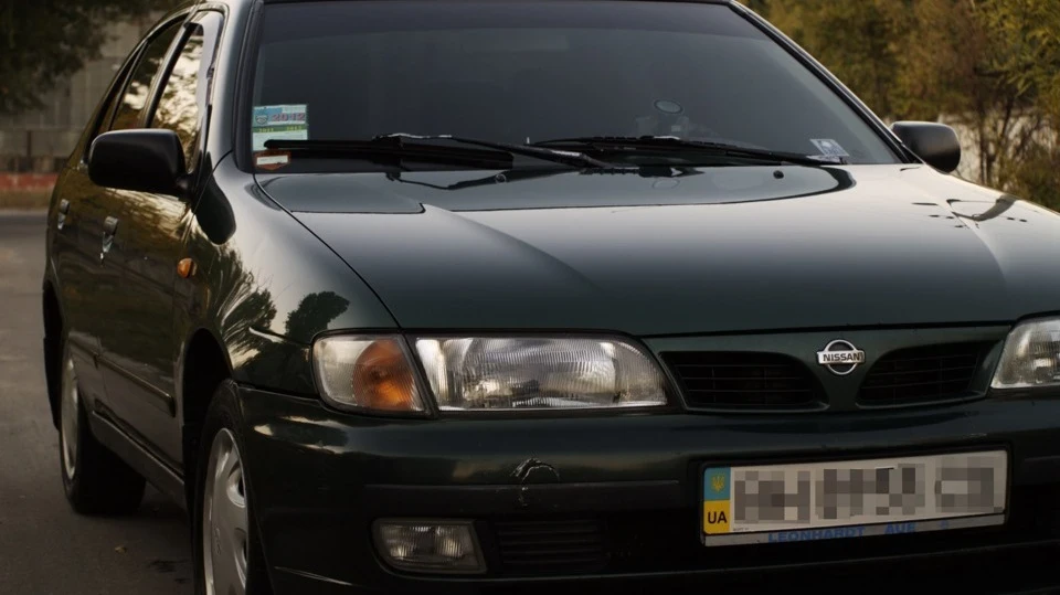 Nissan Almera SLX 1.6 - Зеленуша 5