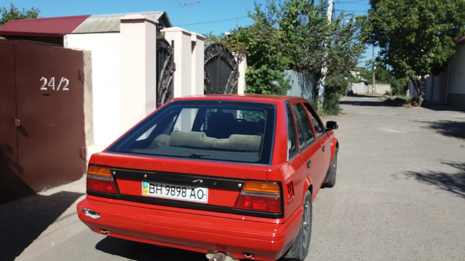 Nissan Bluebird Червоний металік. 2.0i 2
