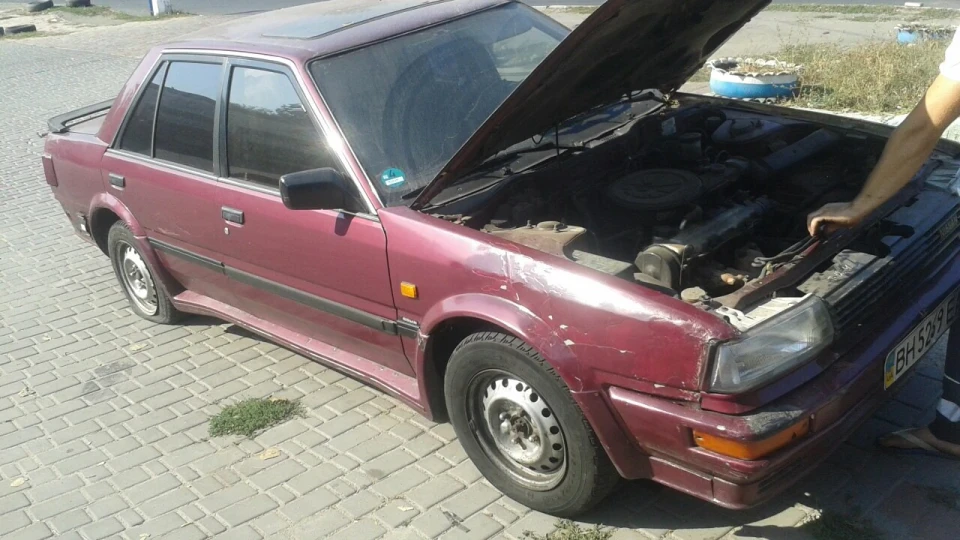 Nissan Bluebird T12 2.0 SLX 3