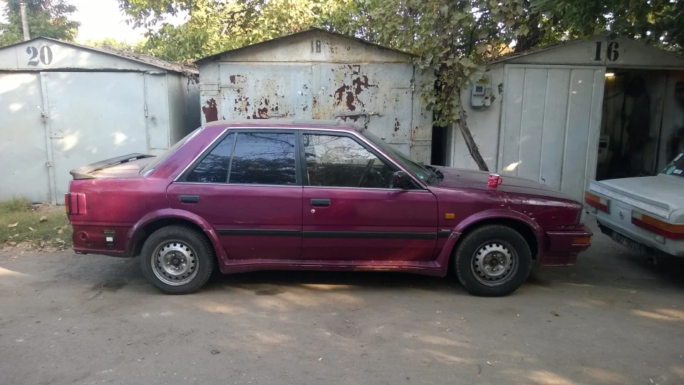 Nissan Bluebird T12 2.0 SLX 5
