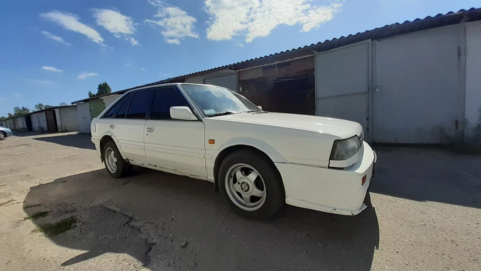 Nissan Bluebird Т12 4