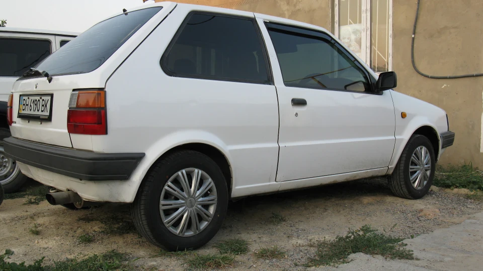 Nissan March Кнопа 2