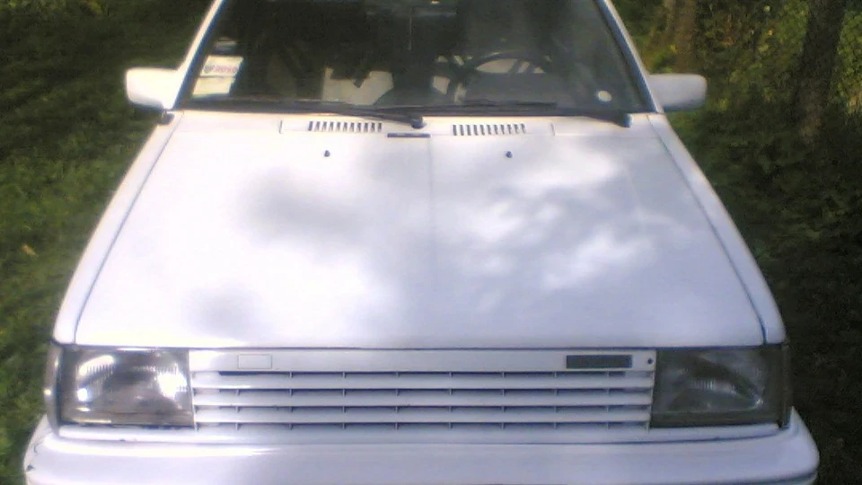 Nissan Micra біла 1.0 карб. 5