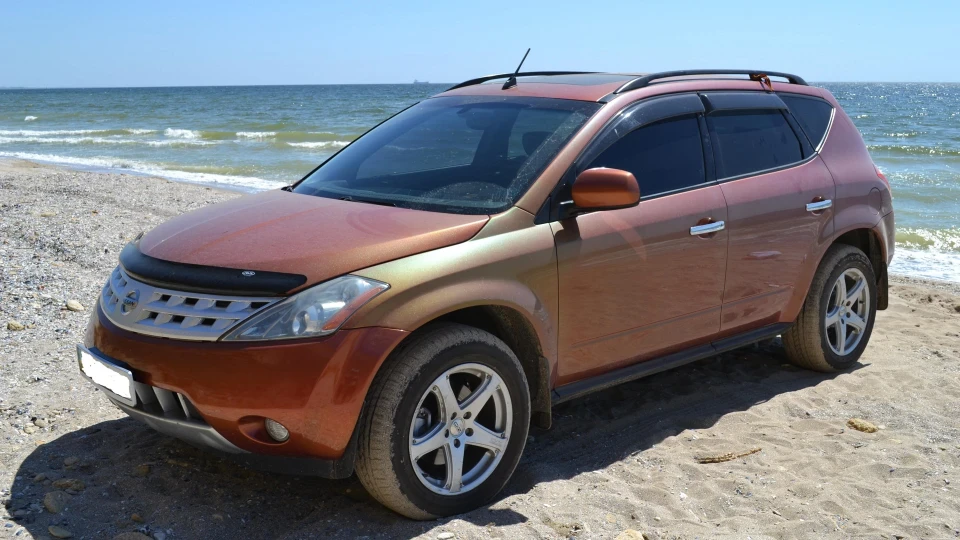 Nissan Murano хамелеонистий апельсець