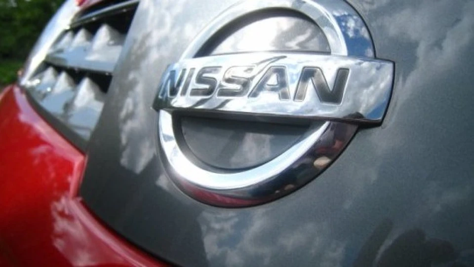 Nissan Note червоненький єнотик 2