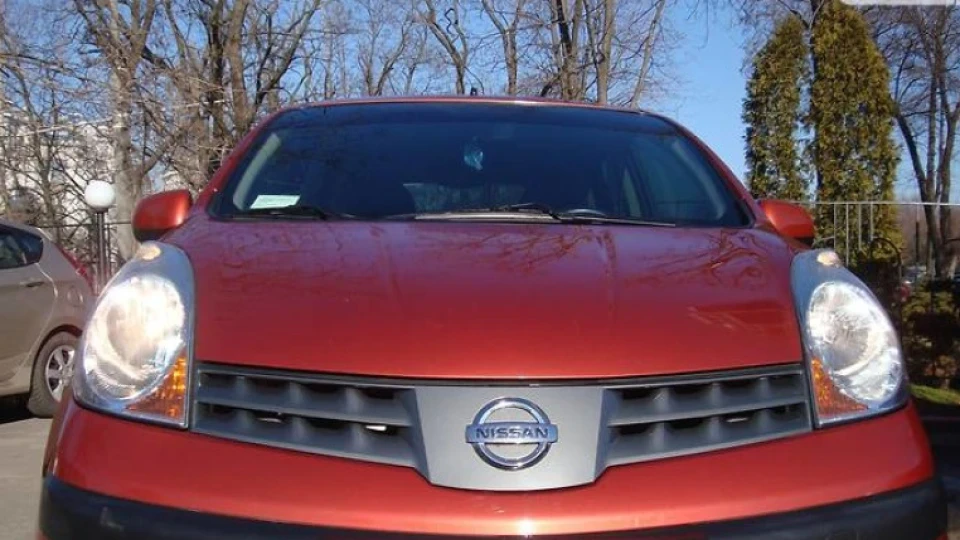 Nissan Note рудий єнотик
