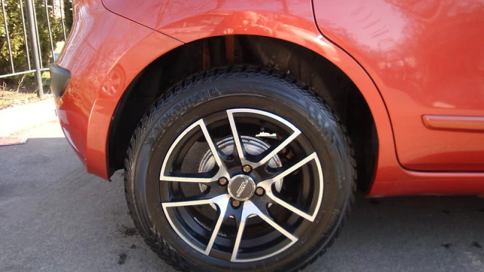 Nissan Note рудий єнотик 3