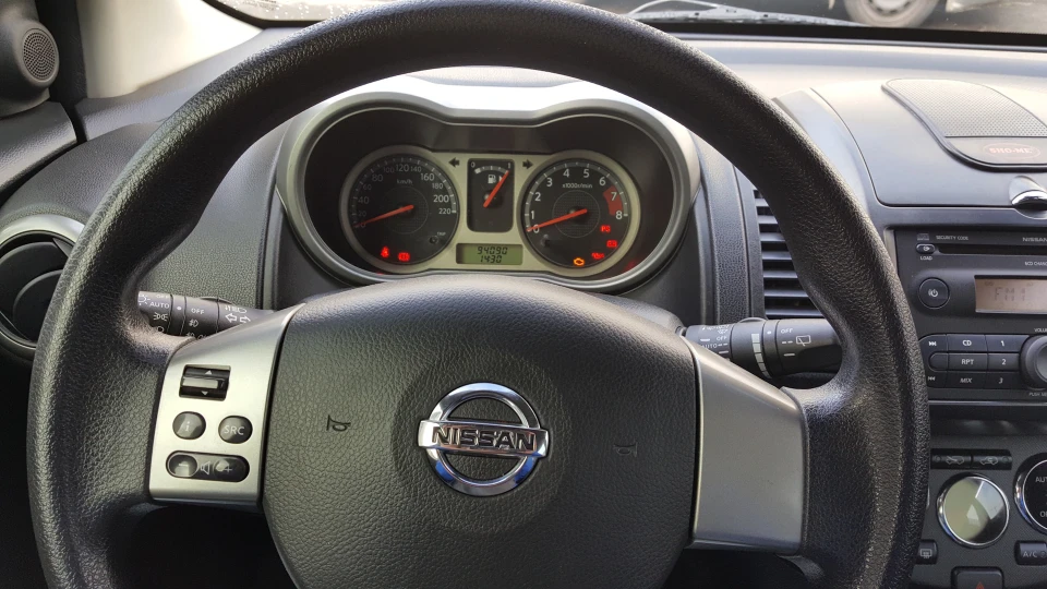 Nissan Note рудий єнотик 4