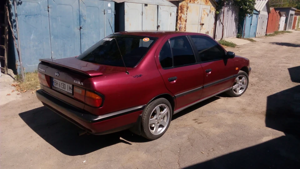 Nissan Primera Вишневий 2.0 моноінжекто 3