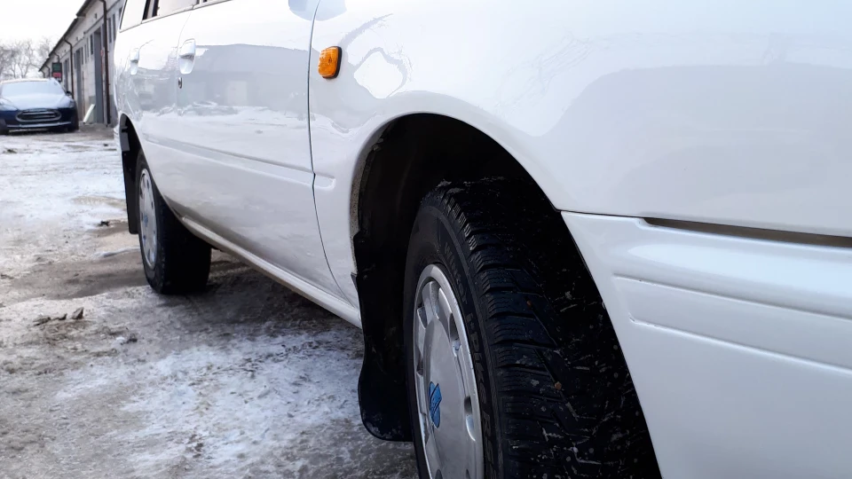 Nissan Sunny Білий перламутр 4