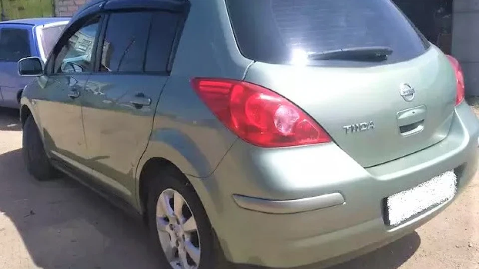 Nissan Tiida Зелений металік 3