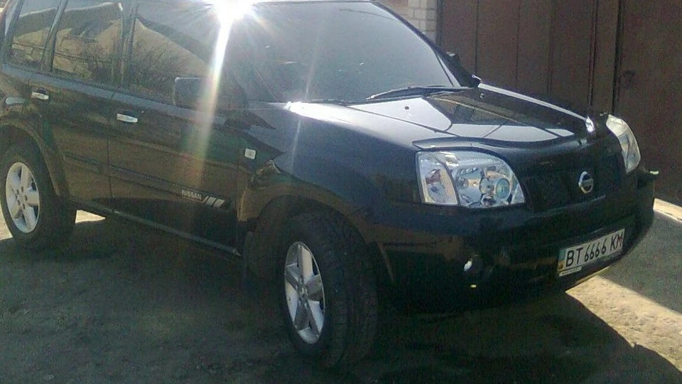 Nissan X-Trail 2.5 AT БАНДИТ) 2