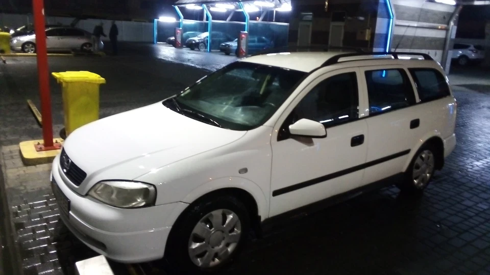 Opel Astra білий караван 4