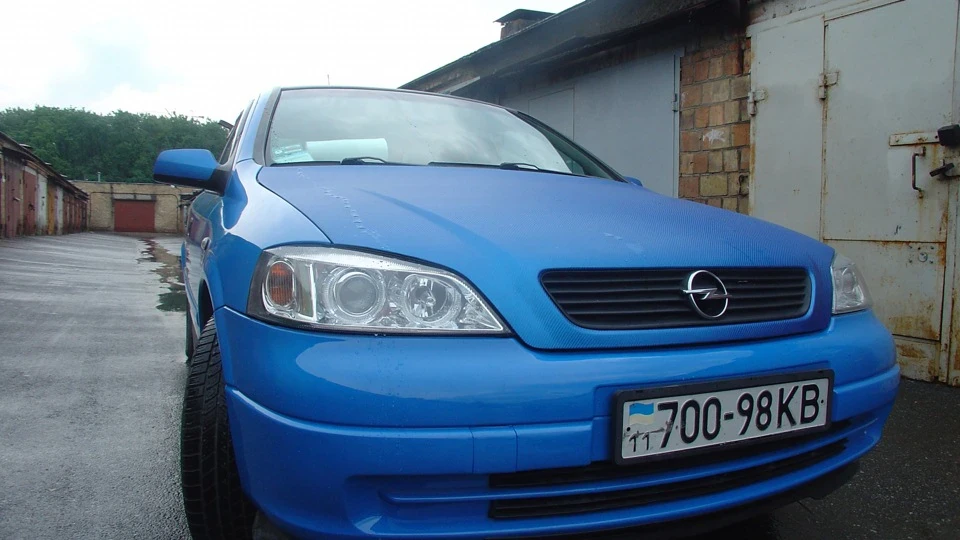 Opel Astra СинійКарбон з Angel Eyes 2