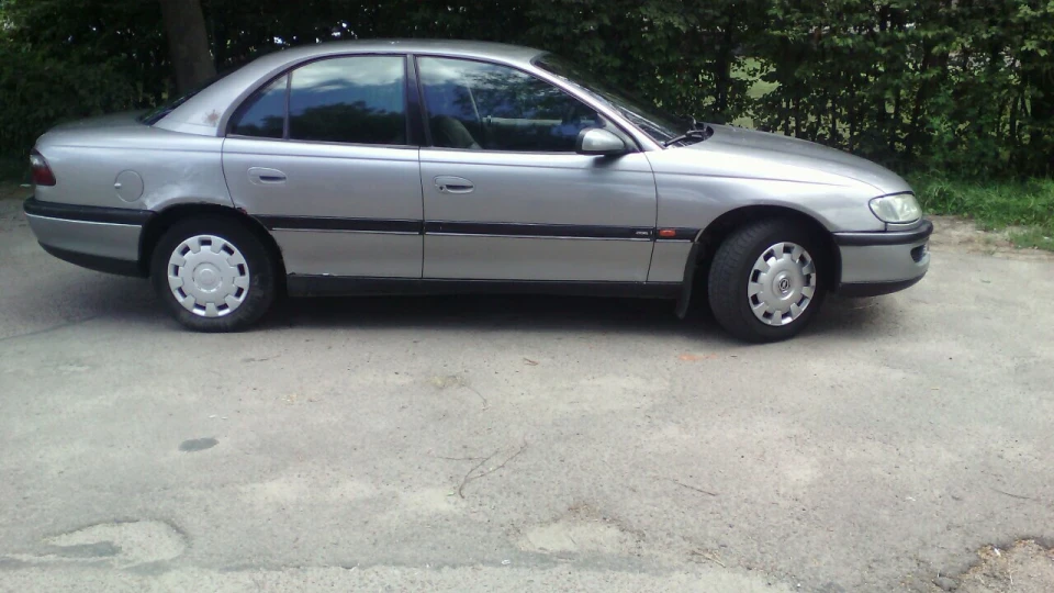 Opel Omega сіра шкіра в салоні 3