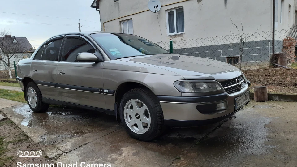 Opel Omega сірий металік, автомат,
