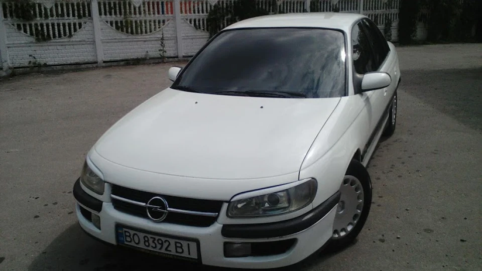 Opel Omega white car 2