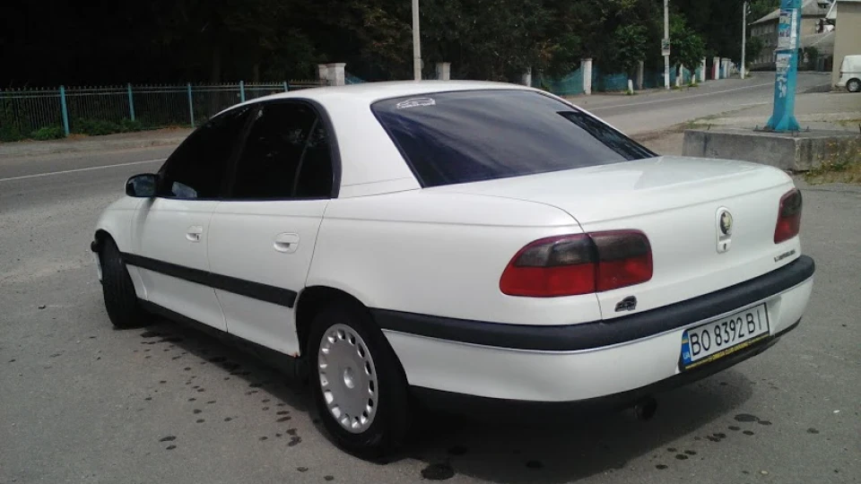 Opel Omega white car 3