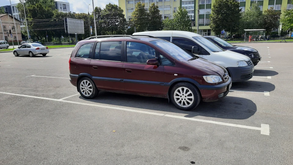 Opel Zafira Opel))) 2