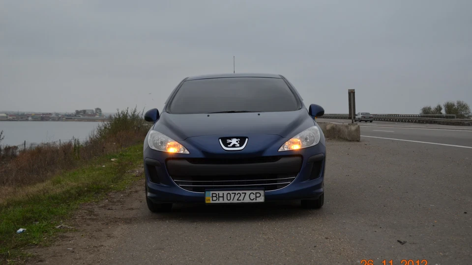 Peugeot 308 Синій Пиж% 4