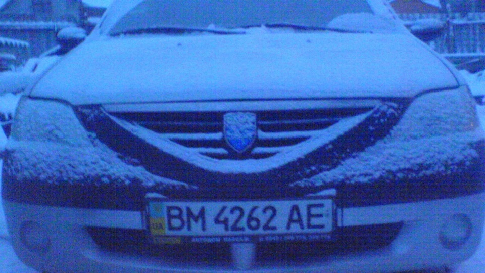 Renault Logan сріблястий. 1,4 бензин 4