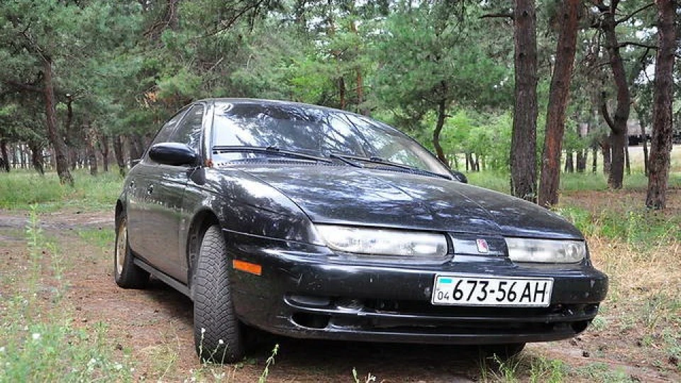 Saturn SL