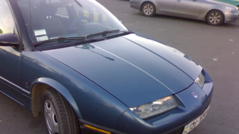 Saturn SL