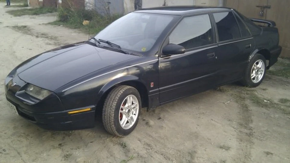 Saturn SL