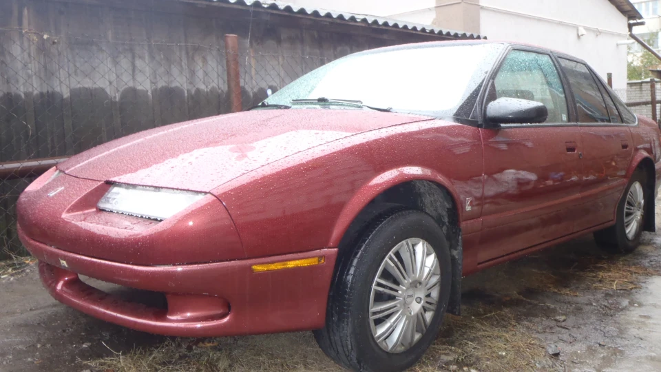 Saturn SL