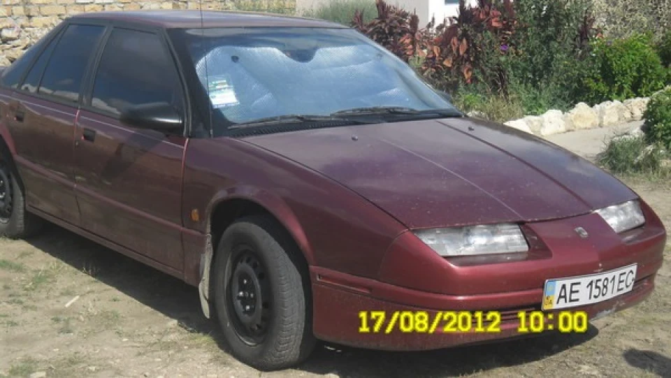 Saturn SL