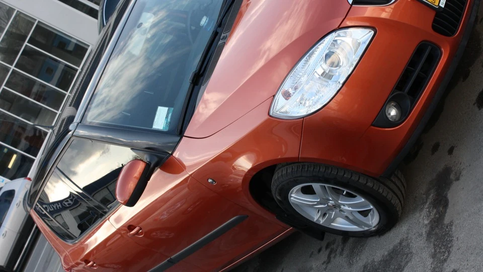 Skoda Fabia Мандариновий СУ-27 4