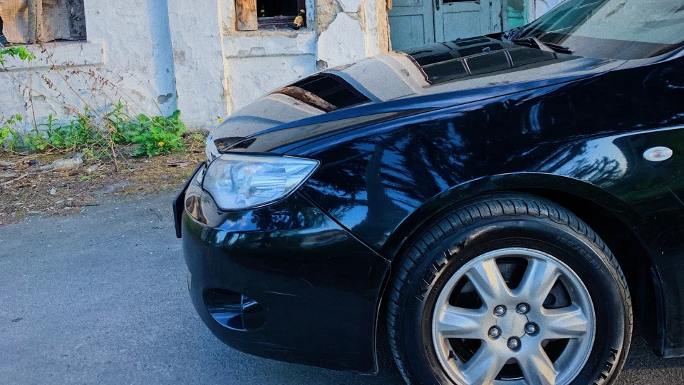 Subaru Impreza Пачка соку на автоматі.