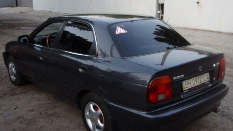 Suzuki Baleno Мокрий асфальт 5