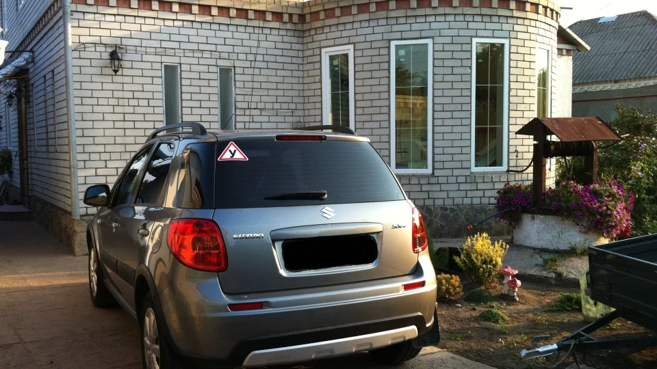 Suzuki SX4 сіренька suzuka