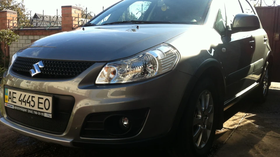 Suzuki SX4 сіренька suzuka 2