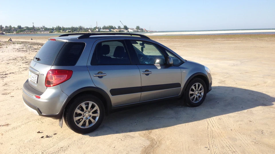 Suzuki SX4 сіренька suzuka 5