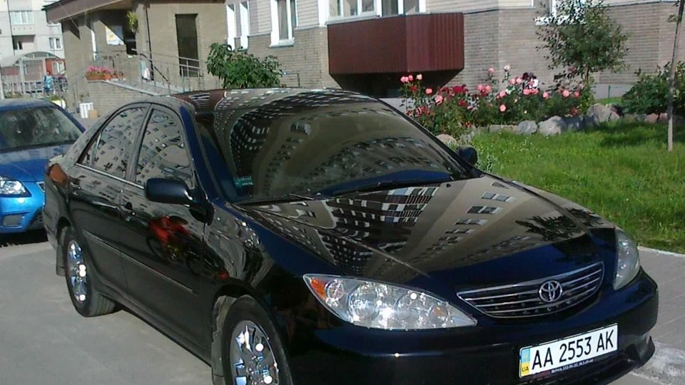 Toyota Camry XLE V6 black star 2