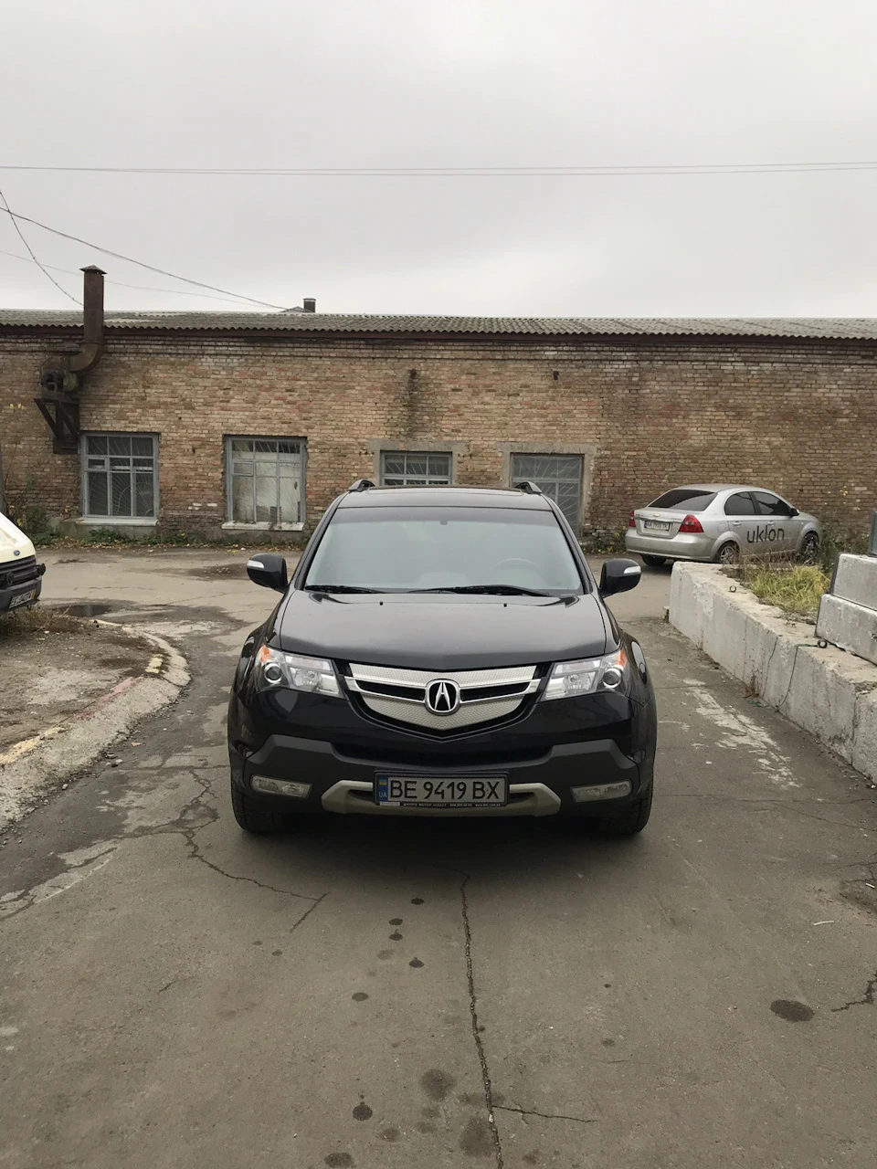 Задні гальмівні колодки та подушка двигуна