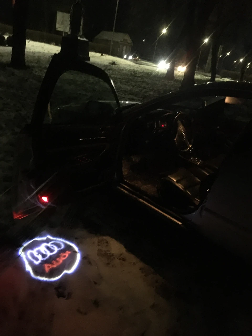 Прекція логотипу Audi