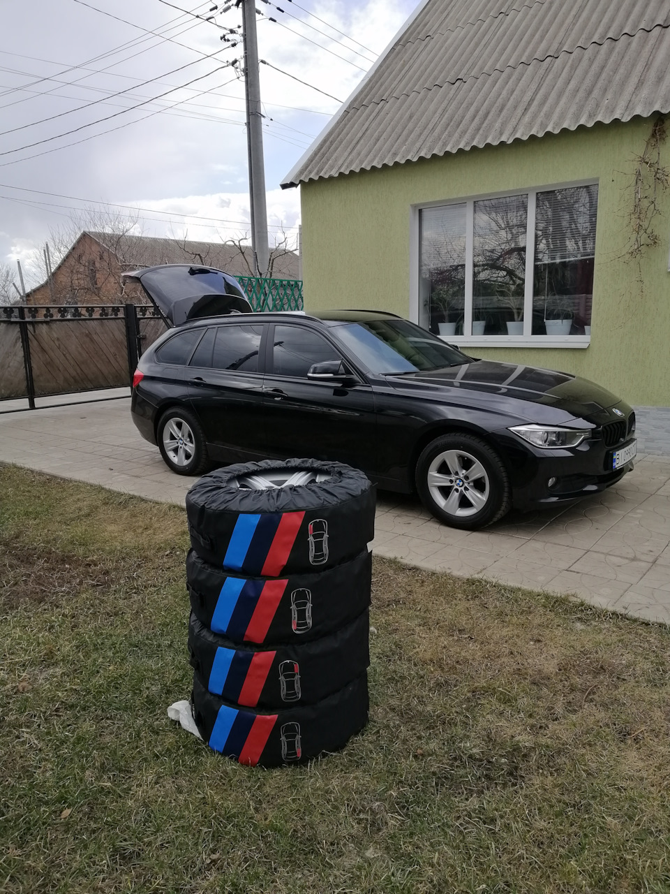 Заміна коліс + комплект оригінальних чохлів BMW для зберігання 1